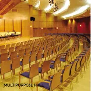 Multipurpose banquet hall with rows of seating at Surat Diamond Bourse
